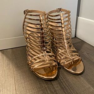 Rose Gold Strappy Sandals by Christian Siriano.